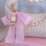 STRAW PEARL BOW BAG